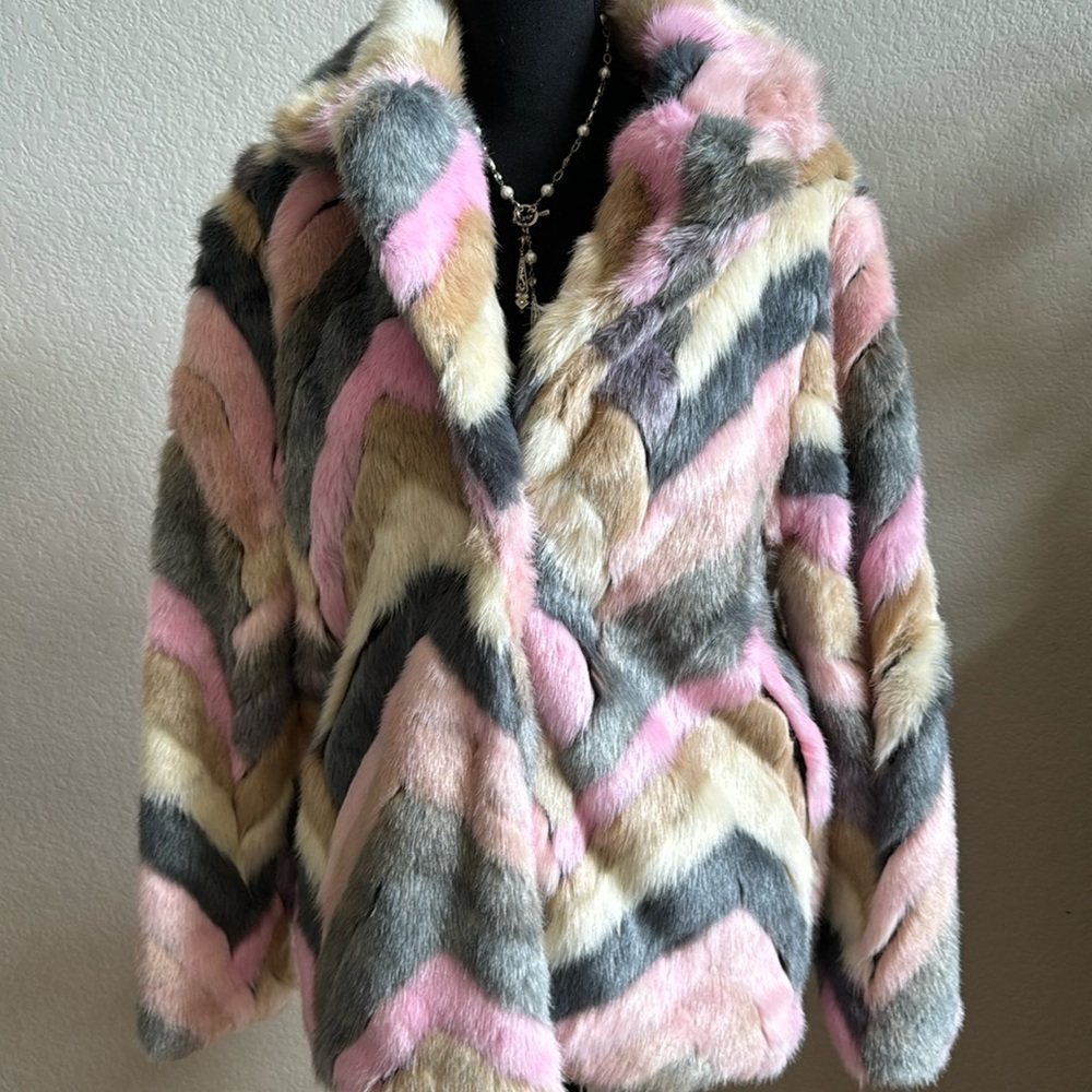 NWT super cute, faux fur coat! Bought from a boutique in Colorado.